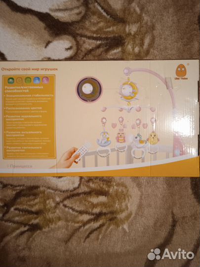 Детский музыкальный мобиль