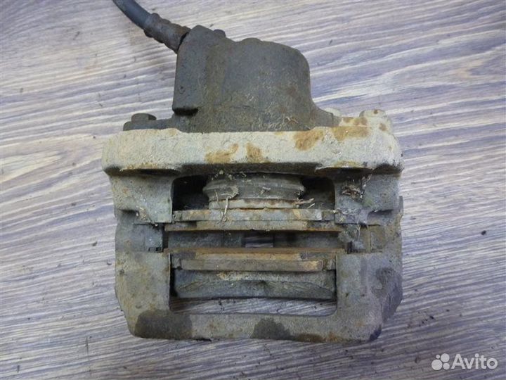 Суппорт передний левый Renault Logan LS0G K7JA710