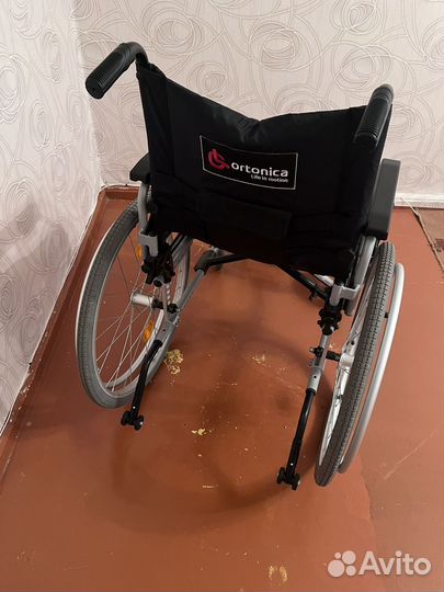 Инвалидная коляска