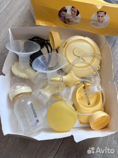 Молокоотсос medela электрический