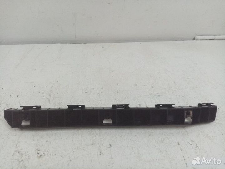 Кронштейн заднего бампера левый Hyundai Tucson 2