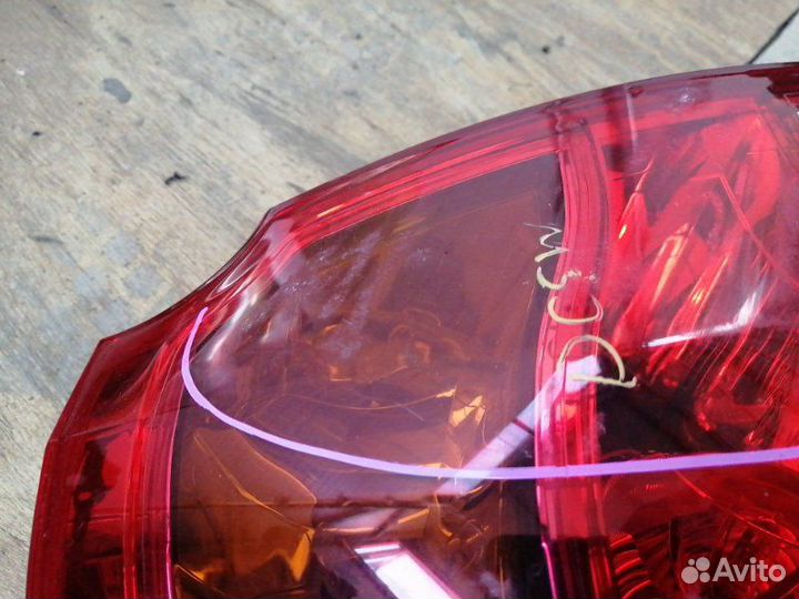 Стоп-сигнал задний левый Mazda Verisa DC5W