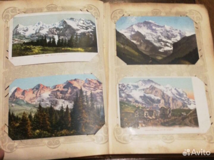 Открытки антикварные в альбоме
