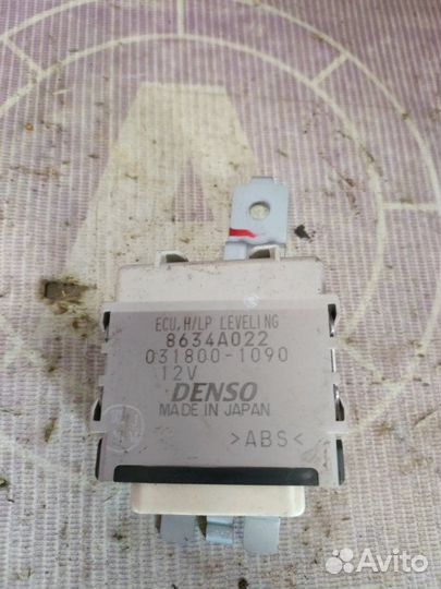 Блок управления корректора фар Mitsubishi