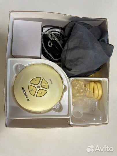 Молокоотсос medela электрический