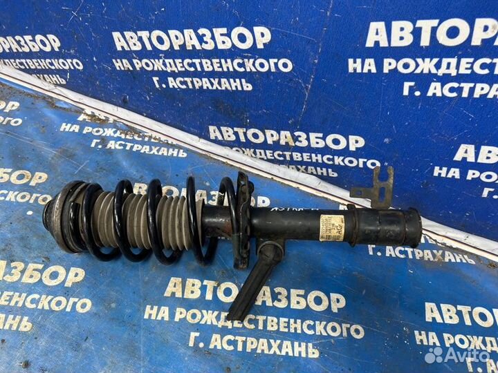 Передняя левая стойка амортизатора Opel Astra Gtc
