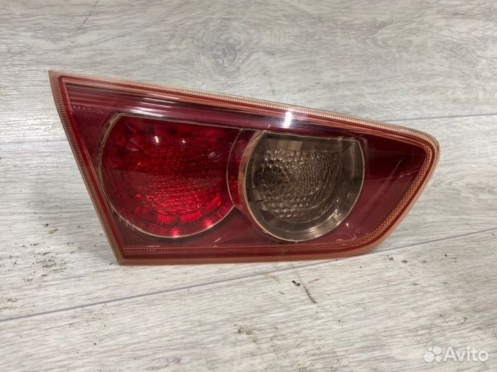 Фонарь внутренний задний левый Mitsubishi Lancer