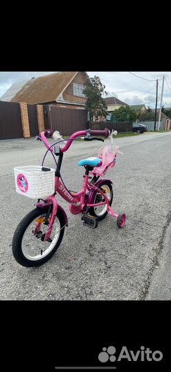Детский четырёхколёсный велосипед