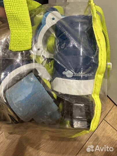 Роликовые коньки