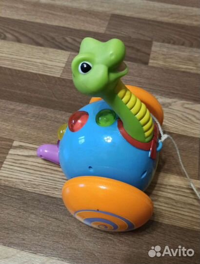 Развивающая игрушка. Каталка музыкальная