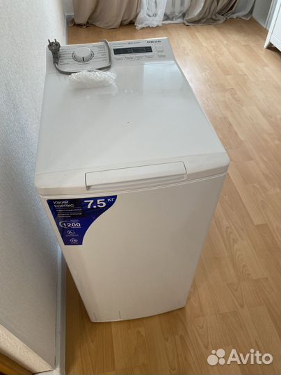 Стиральная машина с вертикальной загрузкой