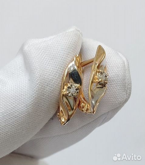 Золотые серьги с камнем