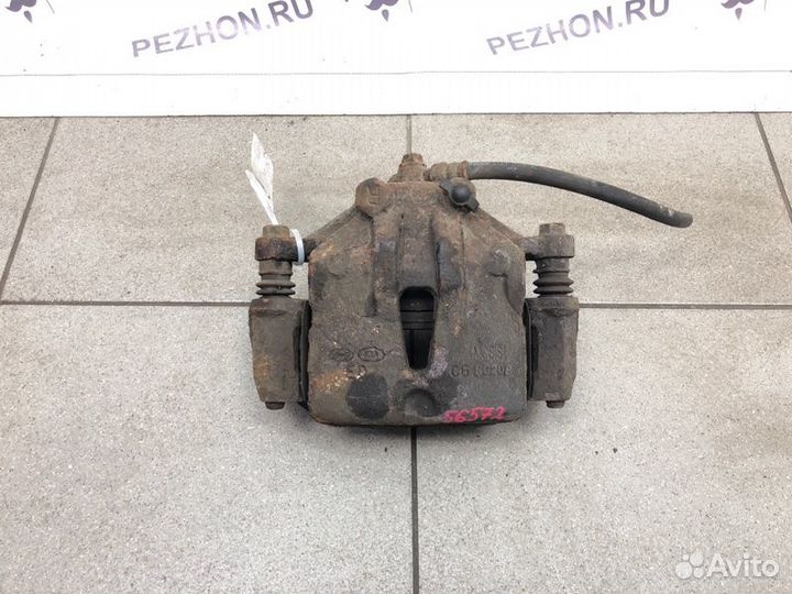 Суппорт тормозной передний правый Kia Ceed хэтчбек