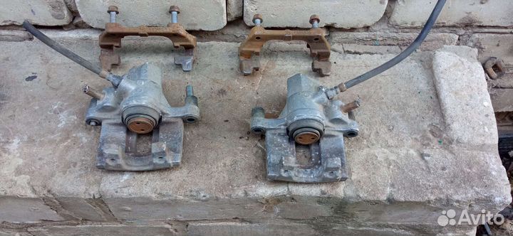 Суппорт тормозной задний мазда 3