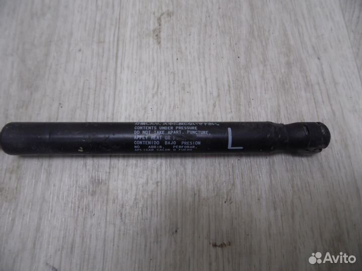 Амортизатор крышки багажника левый Mitsubishi Lanc