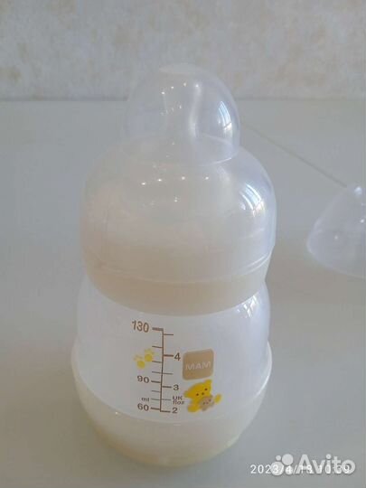 2 Бутылки, соски, градусник для воды