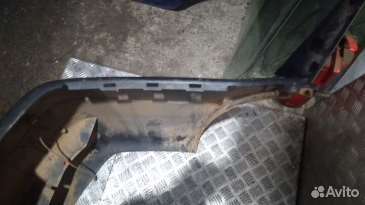 Бампер Logan (04-10) зад под парктроник Б\У