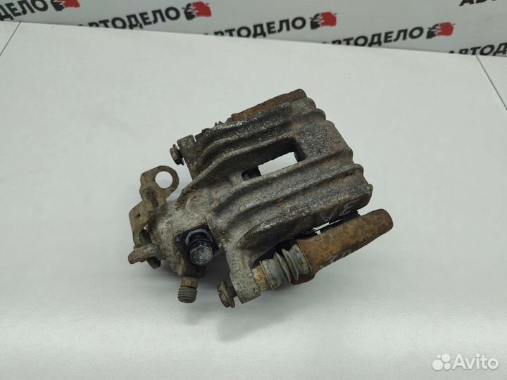 Суппорт тормозной задний левый Volkswagen Golf MK4