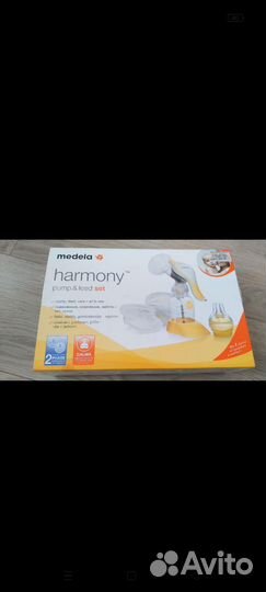 Молокоотсос medela ручной + 2 бутылочки
