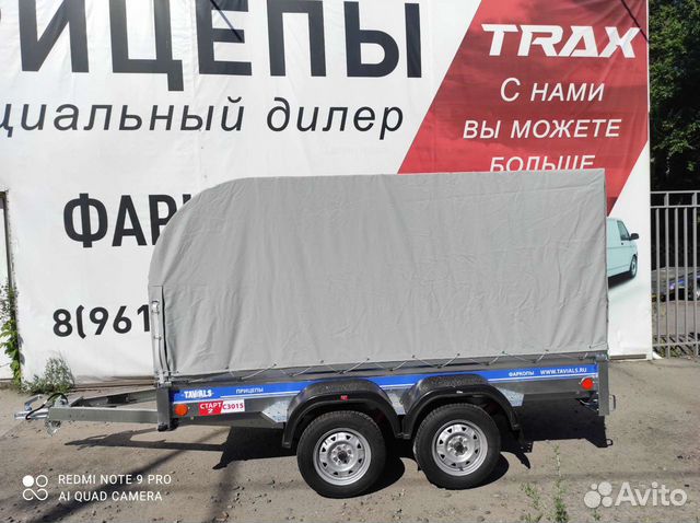 Двухосный легковой прицеп с тентом