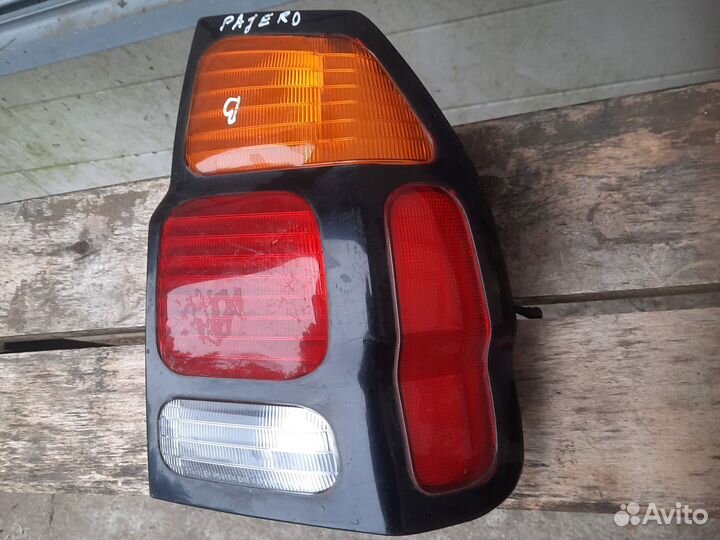 Фонарь задний паджеро спорт