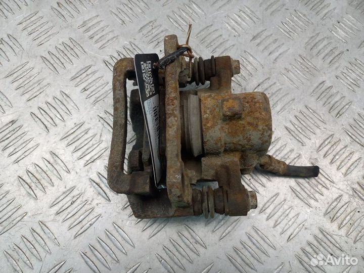 Суппорт задний левый Toyota Corolla 9 E120. E130