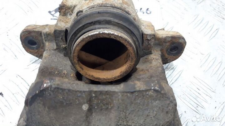 Суппорт тормозной передний левый Renault Logan 1