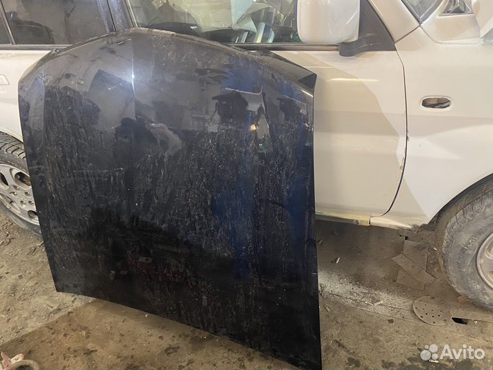 Капот Cadillac CTS 1