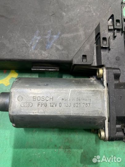 Моторчик стеклоподъемника передний левый