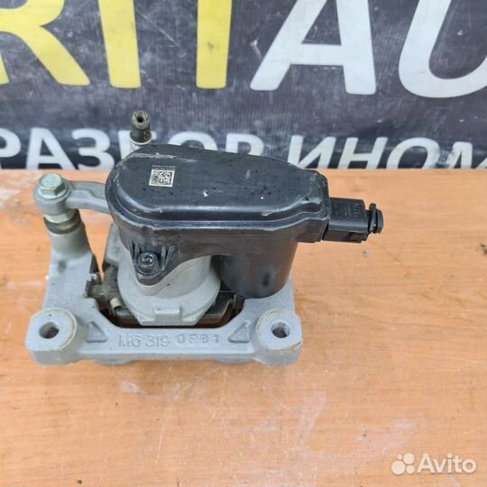 Суппорт тормозной задний левый Kia Mohave 2