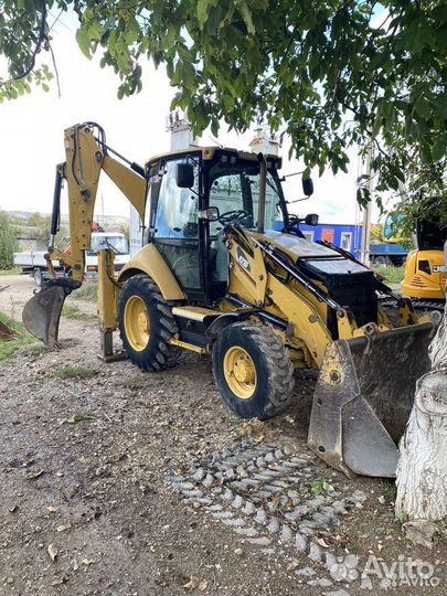 Услуги экскаватора погрузчика с гидромолотом