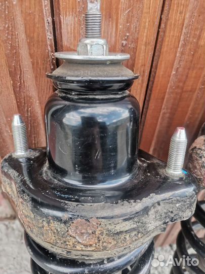 Стойки амортизатора Митсубиси Лансер Х