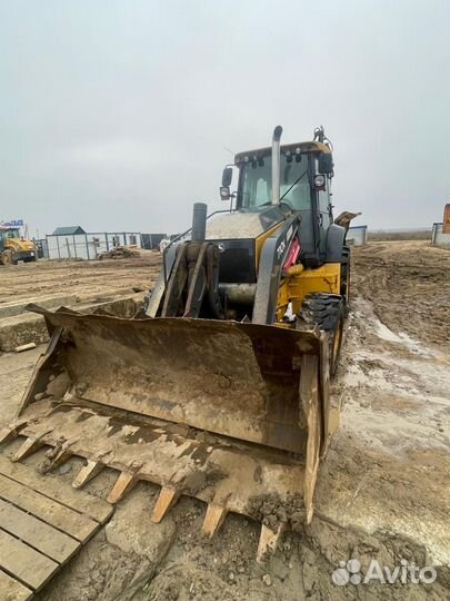 Экскаватор-погрузчик John Deere 710K, 2012