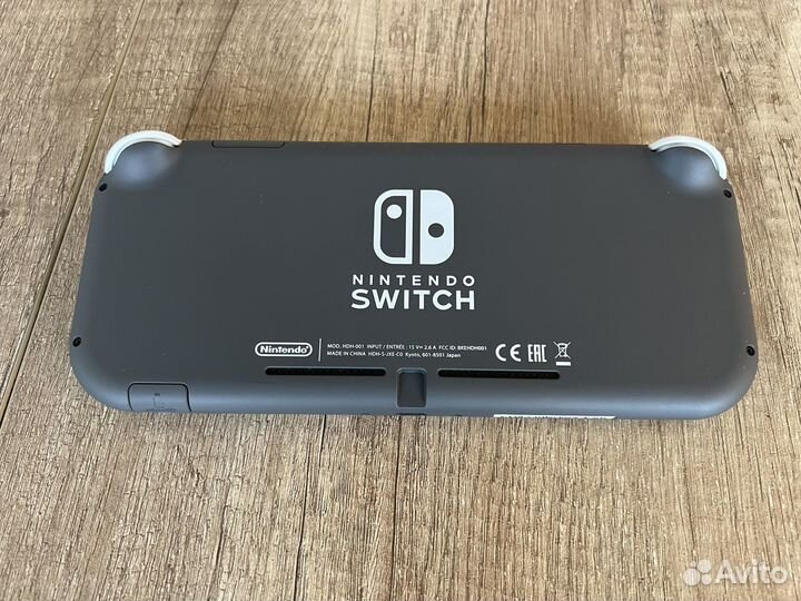 Игровая приставка Nintendo Switch Lite серый рст