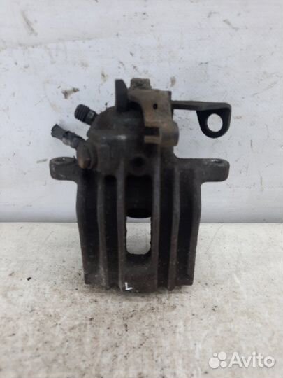 Суппорт тормозной задний левый Volkswagen Golf