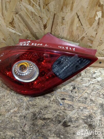 Фонарь задний левый Опель Корса Д 3 дверный купе