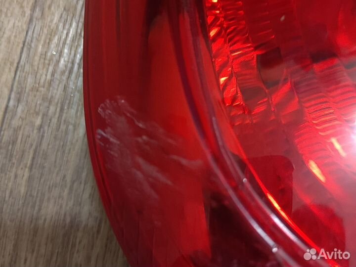 Фонарь задний левый Skoda Rapid
