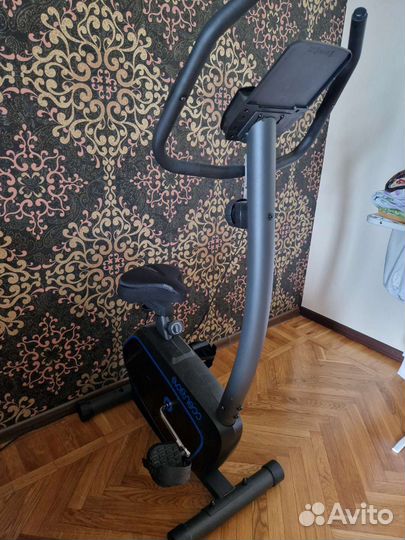 Велотренажер вертикальный Evo Fitness Vega черный