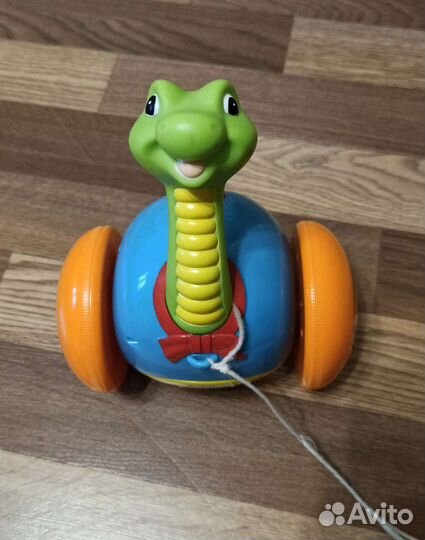 Развивающая игрушка. Каталка музыкальная