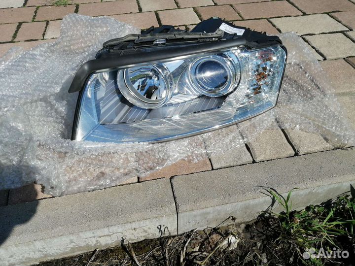Фара левая Audi A8