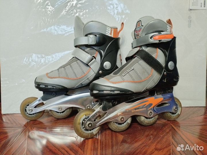 Роликовые коньки