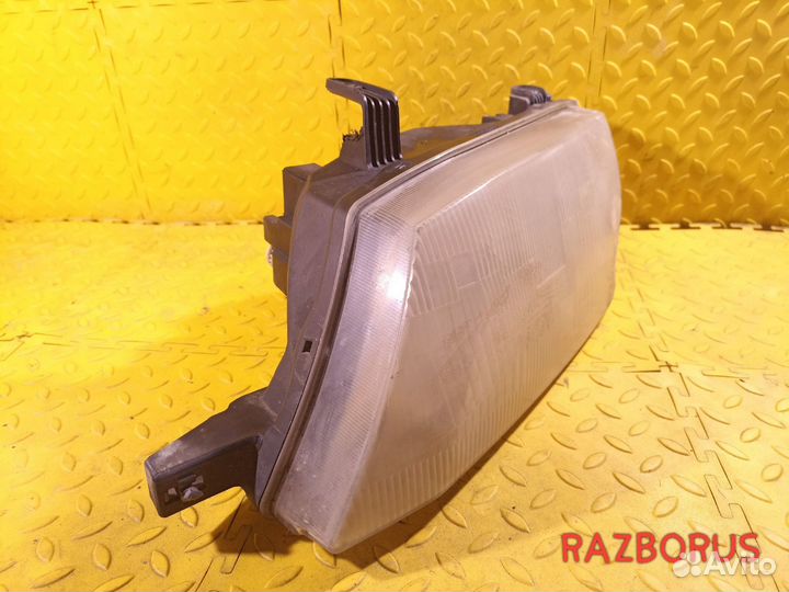 Фара левая Nissan Wingroad / AD Y11