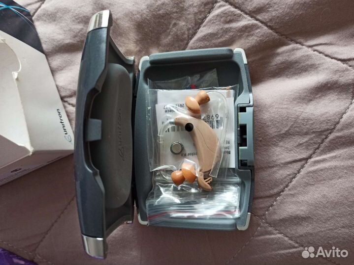 Слуховой аппарат новый Unitron