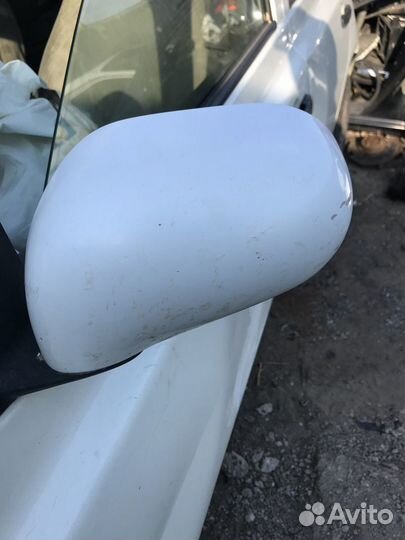 Зеркало левое на Nissan March 1.2л. 2005