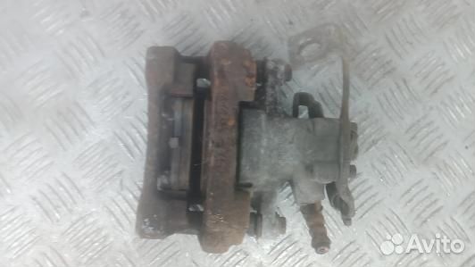 Суппорт тормозной задний левый toyota auris E150 (IUK13LS02)