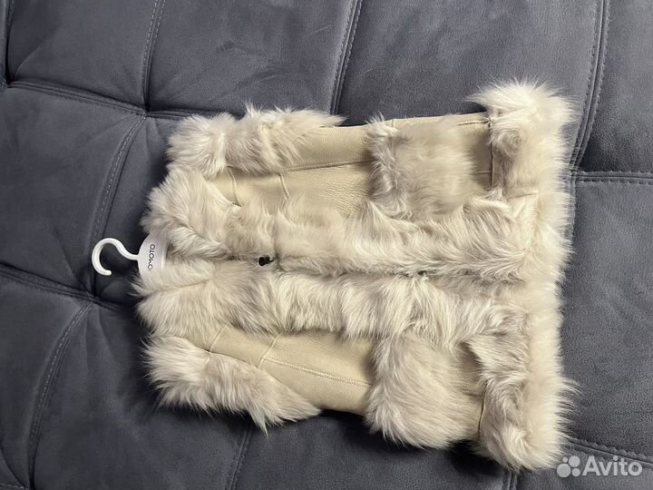 Жилетка кожаная меховая для девочки