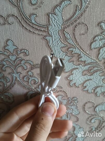 Электрическая зубная щетка