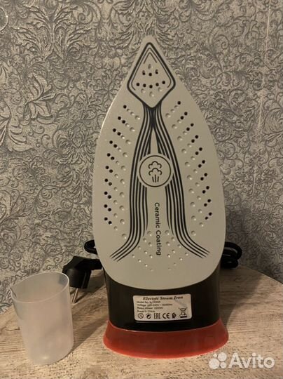 Новый утюг паровой