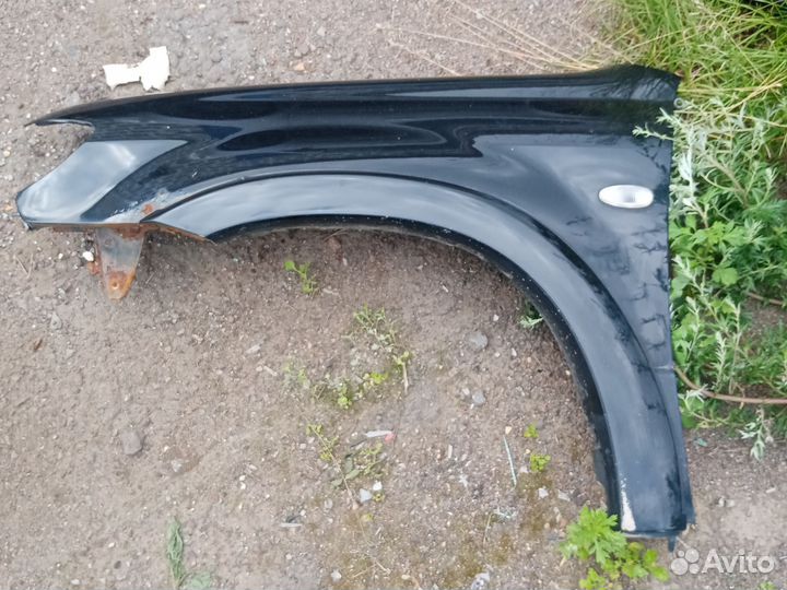 Крыло левое Мицубиси Аутлендер 1