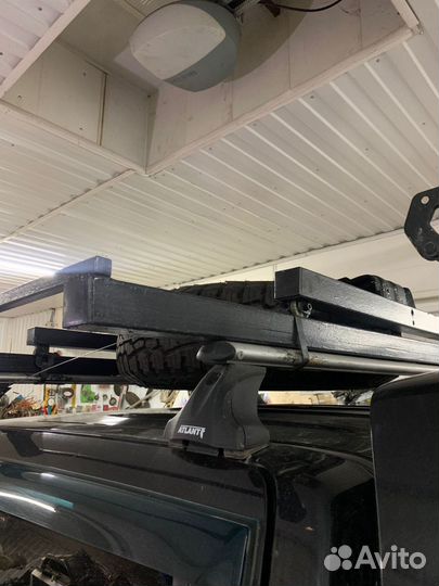 Приспособление для перевозки запасного колеса